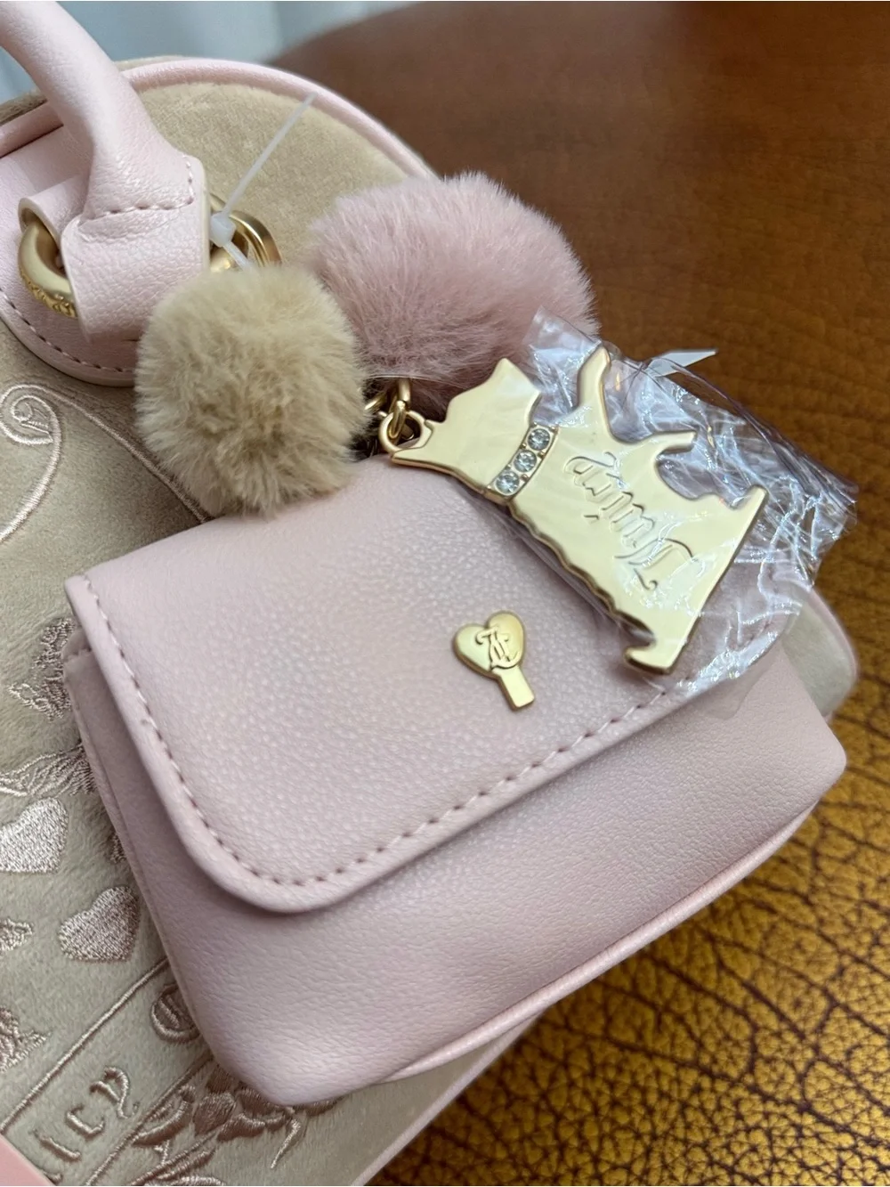 Juicy Couture Blush Pink Suede and Leather Satchel with Pom-Pom Charm